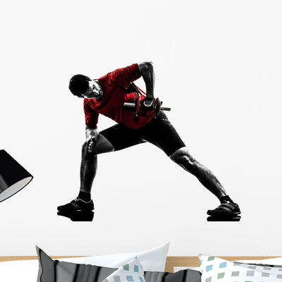 Man Exercising Weight Training Wall Decal shown on a wall