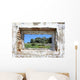spanish countryside seen through hole in wall of ruins Wall Mural
