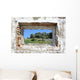 spanish countryside seen through hole in wall of ruins Wall Mural