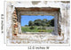 spanish countryside seen through hole in wall of ruins Wall Mural