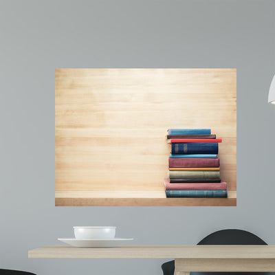 Books shown on a wall