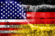 USA and Germany Flag painted on grunge wall 
