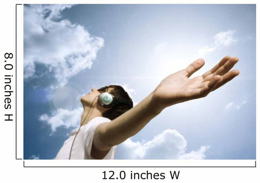 teen with headphones enjoy the music,focus point on hand Wall Mural