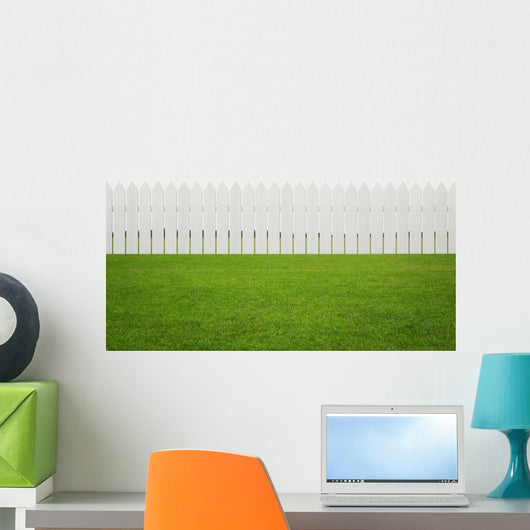Front or back yard, white wooden fence on the grass Wall Mural