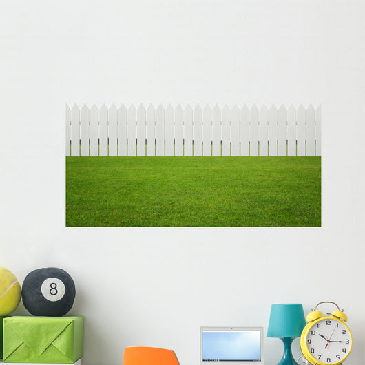 Front or back yard, white wooden fence on the grass Wall Mural