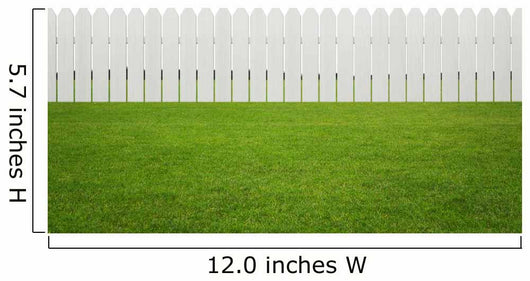 Front or back yard, white wooden fence on the grass Wall Mural