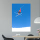 man skiing on slopes of ski resort in spain Wall Mural