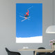 man skiing on slopes of ski resort in spain Wall Mural