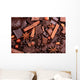 Background from slices of chocolate, coffee, nuts and spices Wall Mural
