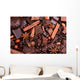 Background from slices of chocolate, coffee, nuts and spices Wall Mural