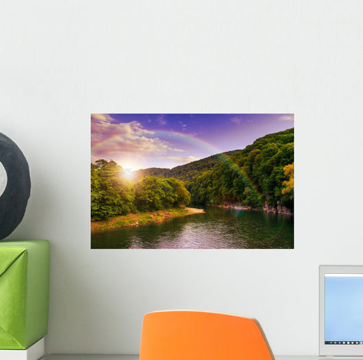 river flows by rocky shore near the autumn mountain forest Wall Mural