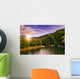 river flows by rocky shore near the autumn mountain forest Wall Mural