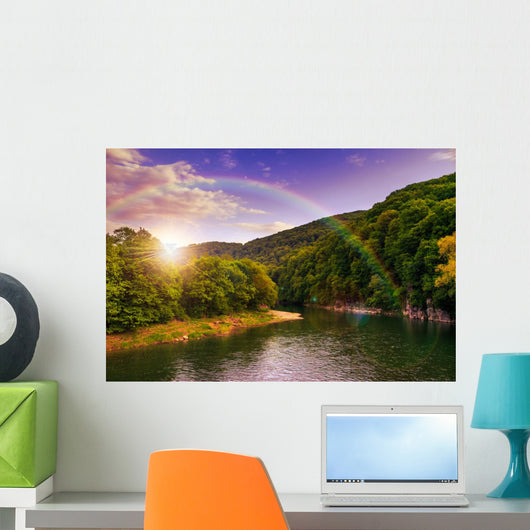 river flows by rocky shore near the autumn mountain forest Wall Mural