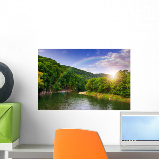 river flows by rocky shore near the autumn mountain forest Wall Mural