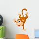 Cute monkey standing in its hand Wall Decal