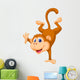 Cute monkey standing in its hand Wall Decal