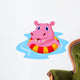 Hippo floating on an inflatable circle in the pool Wall Decal