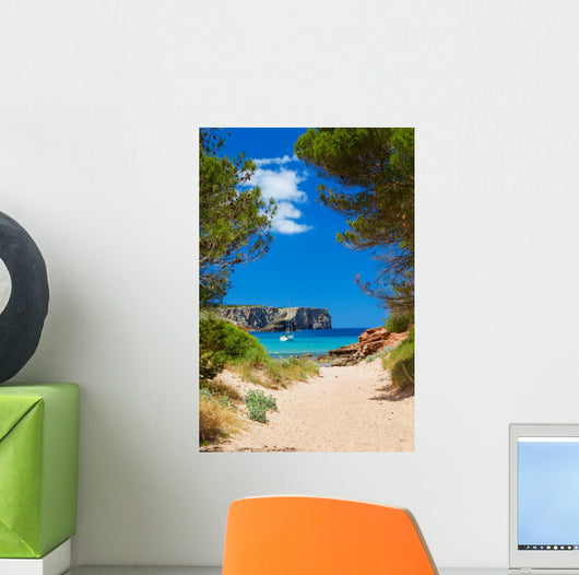 View on Cala Algaiarens from sand pathway to the beach 