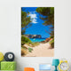 View on Cala Algaiarens from sand pathway to the beach 