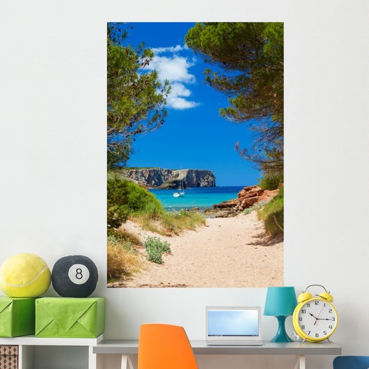 View on Cala Algaiarens from sand pathway to the beach 