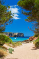 View on Cala Algaiarens from sand pathway to the beach 