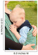 Breastfeeding in baby sling outdoors 