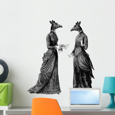 2 Femmes Girafe Wall Decal shown on a wall