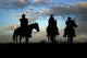 Three Cowboys on Horseback Wall Mural