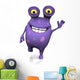A spotted monster waving and looking very happy. 