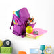 Purple backpack with school supplies isolated on white Wall Decal