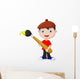 Little boy is painting with paintbrush Wall Decal