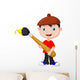 Little boy is painting with paintbrush Wall Decal