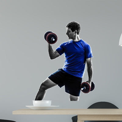 Man Exercising Weight Training shown on a wall
