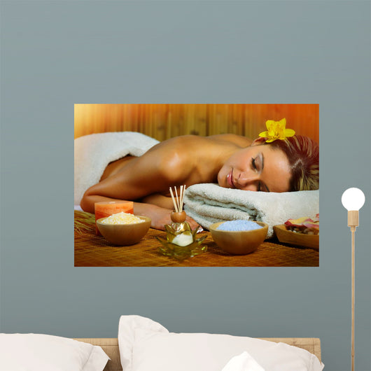 Beautiful woman having massage. Wall Mural
