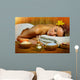 Beautiful woman having massage. Wall Mural