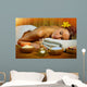 Beautiful woman having massage. Wall Mural
