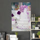 White Wedding Cake Decorated With Purple Flowers 