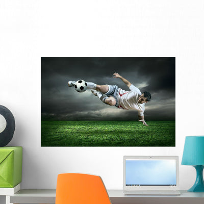 Football Player with Ball shown on a wall