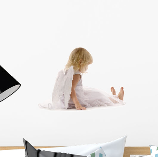little girl sadly sitting in white dress and angel wings Wall Decal