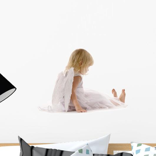 little girl sadly sitting in white dress and angel wings Wall Decal
