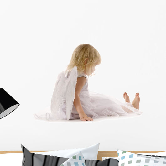 little girl sadly sitting in white dress and angel wings Wall Decal