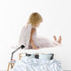 little girl sadly sitting in white dress and angel wings Wall Decal