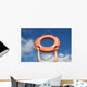 Life buoy ring in man's hands on a background of the sky. Wall Mural