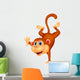Cute monkey standing in its hand Wall Decal