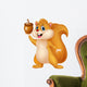 Squirrel cartoon with nut Wall Decal