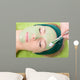 Beauty salon. Cosmetician applying facial mask at woman face. 