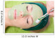 Beauty salon. Cosmetician applying facial mask at woman face. 