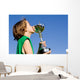 happy successful winner with cup or trophy Wall Mural