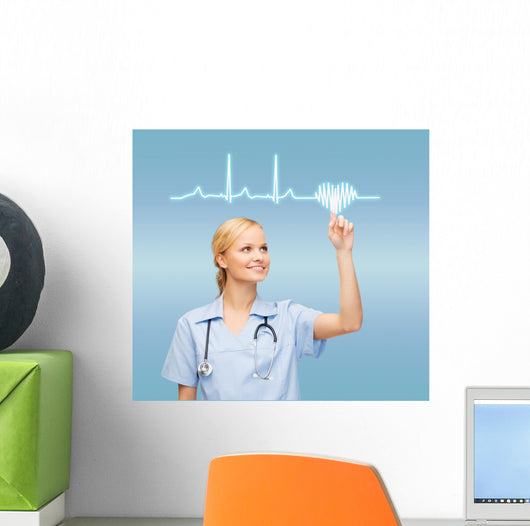 smiling doctor or nurse pointing to cardiogram Wall Mural