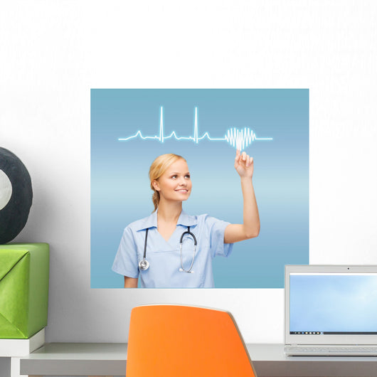 smiling doctor or nurse pointing to cardiogram Wall Mural